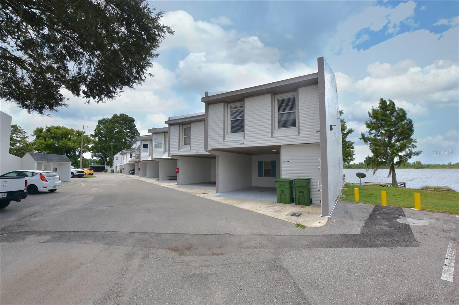 One or more photo(s) has been virtually staged. Waterfront corner unit townhome on Lake Lulu! Chain of lakes living! Check out this 3 bedroom 2 bath 1600 sq ft townhome. This property offers stunning views of Lake Lulu. The home boast an open floor plan. Spacious bedrooms. 1 car carport with storage room/ Laundry room with washer and dryer connections. Large screen room with amazing water views. The master suite offers an ensuite master bath and a private balcony with gorgeous views of nature! Lawn care is included. Additional storage room available for lease. Ask for more details. Administration Fee:
Upon approval tenants will be subject to a $250 one-time administration fee.
***This property is proud to offer deposit-free living to qualified renters through Obligo! We understand that moving costs can add up, so we want to extend financial flexibility to our residents.***
Resident Benefit Package (Included in rental amount):
-Bi-monthly A/C Filter Delivery
-$100,000 Tenant Liability Insurance/ $10,000 Content Coverage
-Identity Protection
-Credit building (All Credit Bureaus)
-Piñata Tenant Rewards Program
-Tenant Portal Access: Online payments & submission of maintenance requests
-24 Hour Emergency Maintenance Hotline
-Pest control