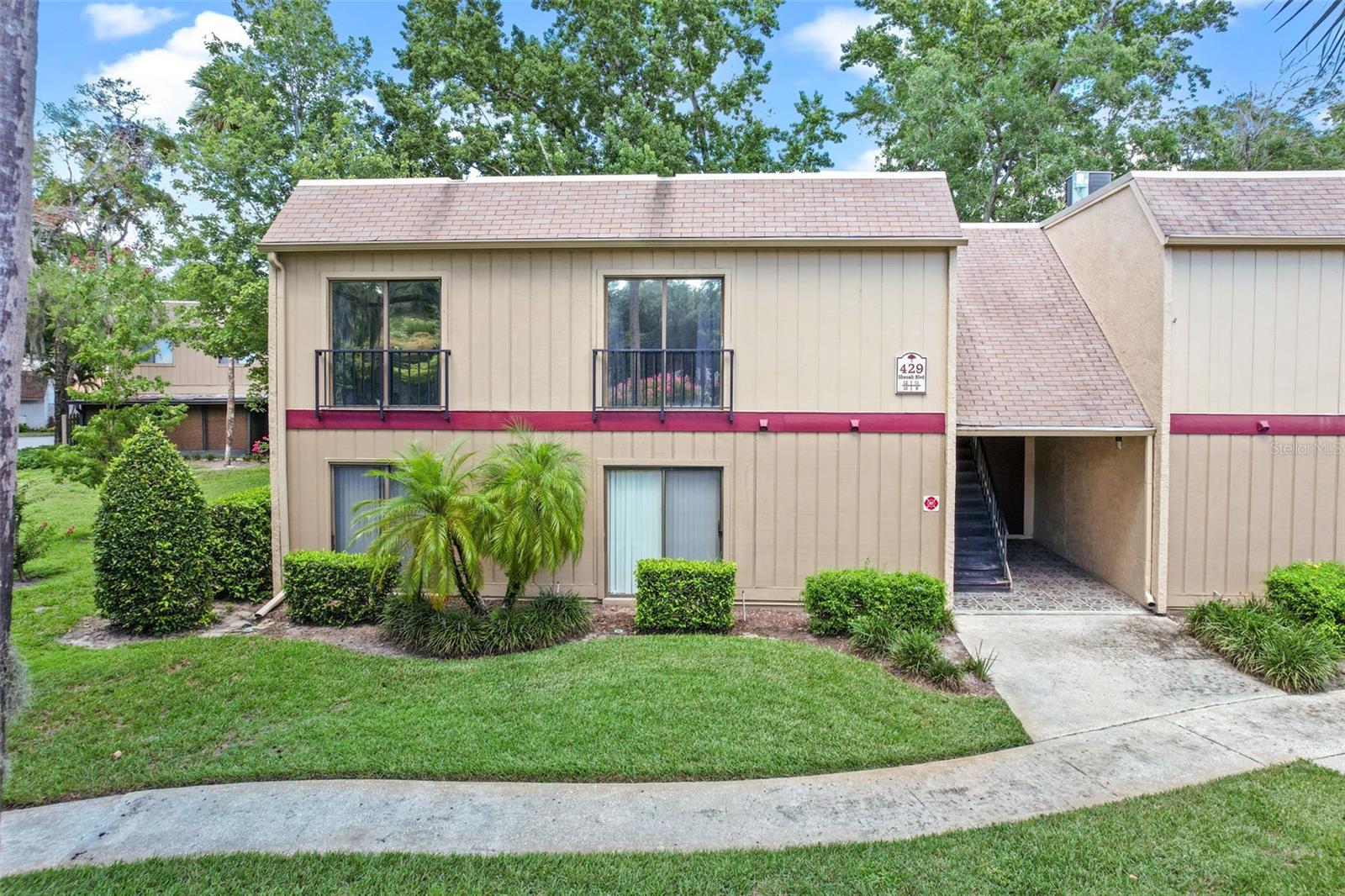 Located in The Highlands, a planned environmental community, this condo offers more than just a home - it's a true Florida lifestyle. Surrounded by winding nature trails and a peaceful creekside path, you'll enjoy a friendly neighborhood setting with regular community events and an abundance of activities. Spend your free time at the junior-sized Olympic pool, play pickleball or basketball with friends, or relax by the lake at the covered pavilion complete with picnic areas and grills. Back at home, this adorable 3-bedroom, 2-bath condo has been thoughtfully updated with quartz countertops throughout, stainless steel appliances, stylish brick-lay tile, and an interior laundry with full size GE washer and dryer. The seamless open floor plan leads to spacious bedrooms, as well as a large screened lanai perfect to enjoy your morning coffee in peace or unwind after a long day. Clean, move-in ready, almost maintenance-free, and set in nature - it's easy to imagine life here. Zoned for top Seminole County schools, and with easy access to UCF, Seminole State College, the 417, Cross Seminole Trail, restaurants, shopping, and the beaches - the location couldn't be better. For added peace of mind, the home has a newer HVAC and water heater, the HOA maintains the roof, and the seller will provide a full 1-year American Home Shield warranty, making it an easy choice for buyers.