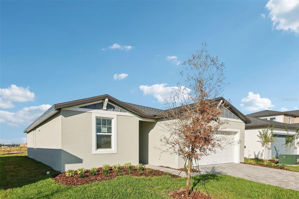 Photo of 3415 Mud Canyon Drive, Davenport, FL 33837 (MLS # O6358408)