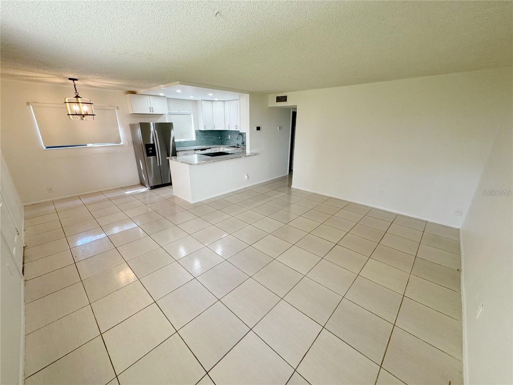 Photo of 3300 Fox Chase Circle N #229, Palm Harbor, FL 34683 (MLS # TB8440998)