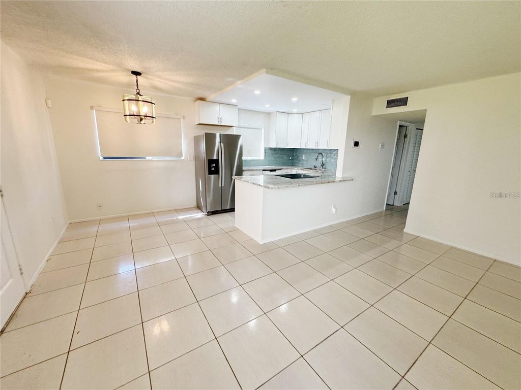 Photo of 3300 Fox Chase Circle N #229, Palm Harbor, FL 34683 (MLS # TB8440998)