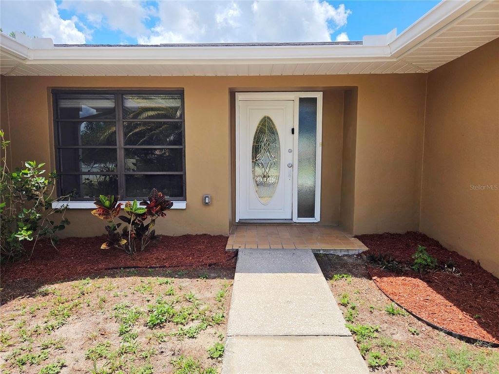 Photo of 6932 Pin Cherry Lane, Port Richey, FL 34668 (MLS # W7876409)