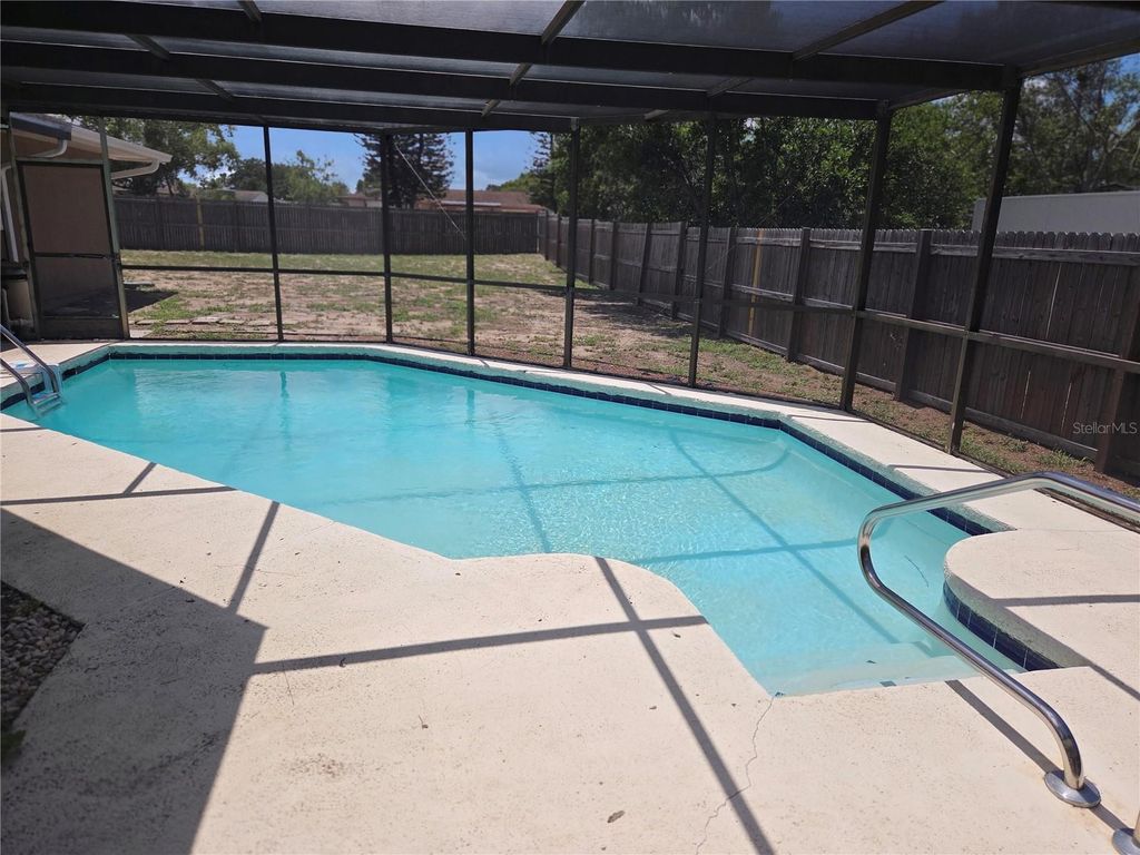 Photo of 6932 Pin Cherry Lane, Port Richey, FL 34668 (MLS # W7876409)