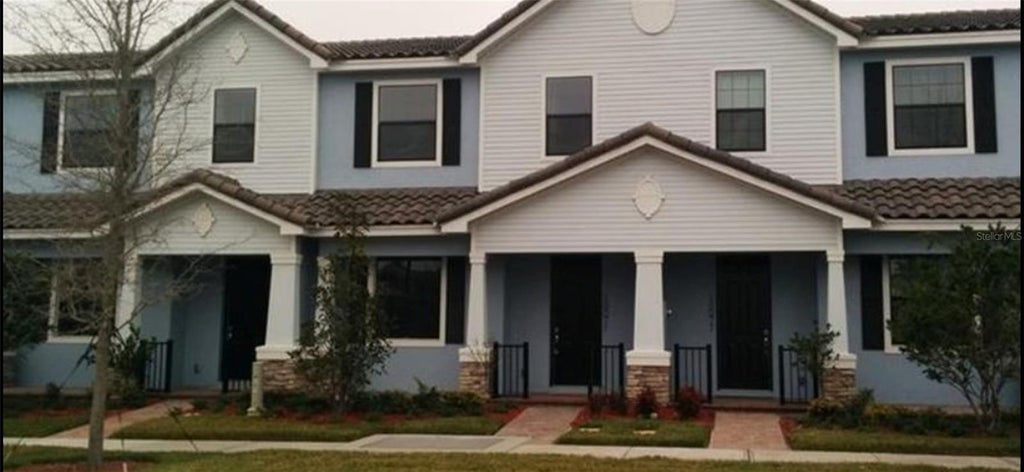 Photo of 10071 Eagle Creek Center Boulevard, Orlando, FL 32832 (MLS # S5158164)