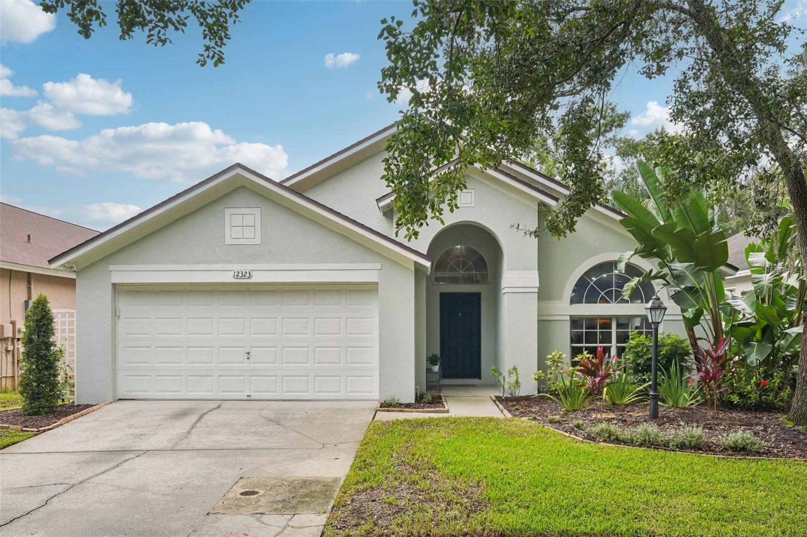 Welcome to this 4-bedroom, 2-bath home in the heart of Westchase, offering 1,699 sq. ft. of thoughtfully designed living space. Recent updates include fresh interior and exterior paint, upgraded hardware and lighting, and elegant details such as chair rails, wainscoting, and crown molding. The bright kitchen has been tastefully updated, while the spa-inspired primary bath provides a relaxing retreat. Enjoy peace of mind with a whole-house Culligan water treatment and purification system for clean, fresh water throughout the home. Head outside to enjoy a heated saltwater pool surrounded by a private outdoor setting. The neighborhood features quiet, tree-lined streets, parks, and shaded sidewalks, along with access to community pools, tennis, pickleball, and basketball courts. Ideally located near Tampa International Airport, major shopping destinations, and beautiful Gulf beaches. A wonderful place to feel at home both inside and out.