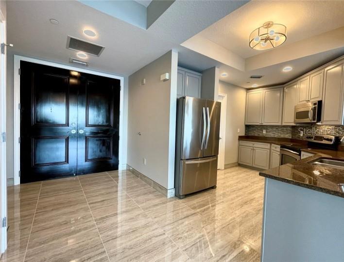 TOWERS OF CHANNELSIDE CONDOMIN - Residential Lease