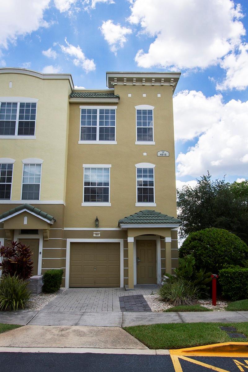 Turn-key investment and vacation retreat at Vista Cay Resort. This fully furnished 3-bedroom, 3.5-bath CORNER UNIT townhome offers luxury, convenience, and strong income potential in one of the only Orange County communities zoned for short-term rentals. Ideally located across from the new Universal’s Epic Universe Theme Park and just minutes from the Orange County Convention Center, International Drive, SeaWorld, Disney, and Orlando International Airport, this property is positioned at the center of Orlando’s top business and leisure destinations.
The home features three spacious bedrooms, each with a private en-suite bathroom, plus a guest half bath. The open-concept second floor offers 9’ ceilings, abundant natural light, a private balcony, and a gourmet kitchen with stainless steel appliances and ample cabinetry. Additional highlights include a ground-floor suite with French doors opening to a patio, a one-car garage with guest parking, and professional designer furnishings. Recent upgrades include newer luxury vinyl plank flooring and a new roof (2022).
Vista Cay Resort provides resort-style amenities including three pools, two full-service poolside bars, a fitness center, movie theater, game room, clubhouse, basketball court, playground, BBQ grills, fire pits, and a 2-mile scenic lakefront walking trail. The gated community offers 24-hour security, beautifully maintained landscaping, and an HOA that covers internet, cable, trash, and access to all amenities.
With no minimum lease restrictions, this property is approved for Airbnb/VRBO and is well-positioned to generate significant rental income. Daily, weekly, monthly, or long-term rentals are allowed, and future bookings can be transferred to the new owner if using the same management company.
Whether used as a full-time residence, vacation home, or income-producing property, this Vista Cay townhome is a rare opportunity to own in one of Orlando’s most desirable and flexible resort communities.