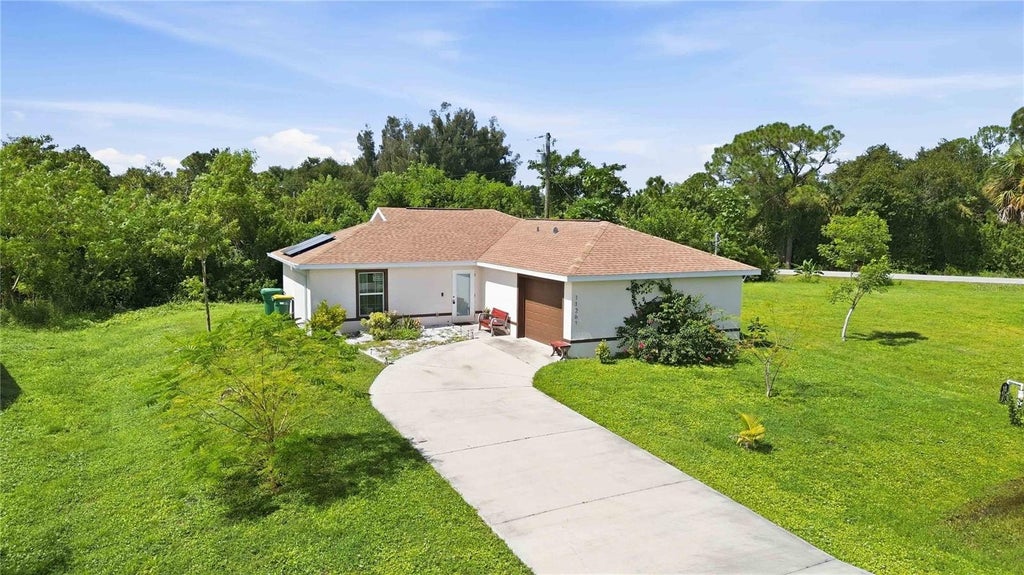 Photo of 11261 6th Avenue, Punta Gorda, FL 33955 (MLS # D6148837)