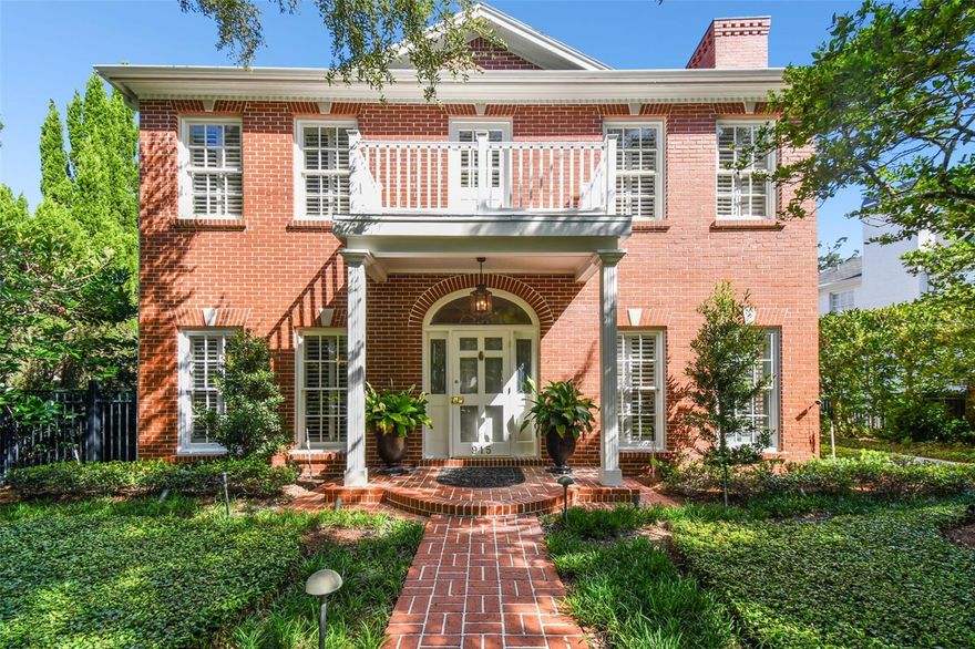 Welcome to this beautiful, stately brick home located in the Golf View neighborhood, one of the most sought-after areas in Tampa. This exquisite residence was extensively renovated in 2010 with timeless finishes and features gorgeous hardwood floors and intricate molding details and custom storage throughout. The chef's gourmet kitchen designed by Chip Vogel is a culinary dream, complete with an island with leathered granite, inset custom cabinetry, a Wolf range, Subzero fridge & wine fridge, and a large pantry. The kitchen seamlessly flows into the family room, which includes a breakfast area, gas fireplace, built-ins, and French doors leading to a rear screened porch.

The main level also boasts a formal dining room and a living room with another gas fireplace, perfect for entertaining. Upstairs, you will find a spacious primary suite with vaulted ceilings, a wood-burning fireplace, French doors opening to a screened porch, and an updated luxurious bathroom featuring a morning bar w/ fridge, dual sinks, built-ins, and a large walk-in closet. The upper level also includes a convenient laundry room, three additional bedrooms, and two hall baths.

The backyard offers ample space for a pool and includes an oversized detached two-car garage with a workshop. Additionally, a Porte Cochere provides easy covered access to the home. This property is a true gem, combining luxury, comfort, and convenience in one of Tampa's finest locations. Don't miss the opportunity to make this your dream home!