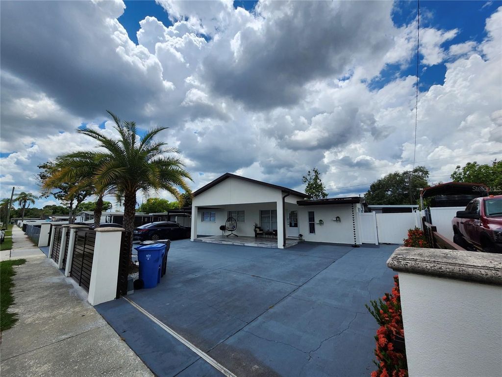 Photo of 7514 Paradise Place, Tampa, FL 33619 (MLS # TB8525229)