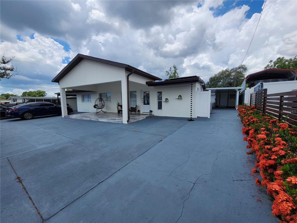 Photo of 7514 Paradise Place, Tampa, FL 33619 (MLS # TB8525229)