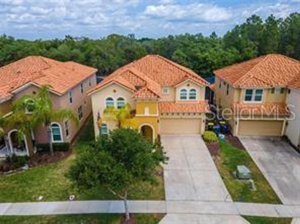 Photo of 446 Orange Cosmos Boulevard, Davenport, FL 33837 (MLS # O6390388)