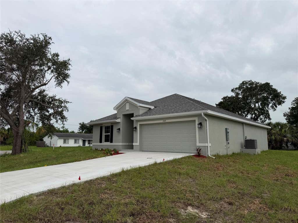 Photo of 21426 Dekals Avenue, Port Charlotte, FL 33952 (MLS # C7528718)