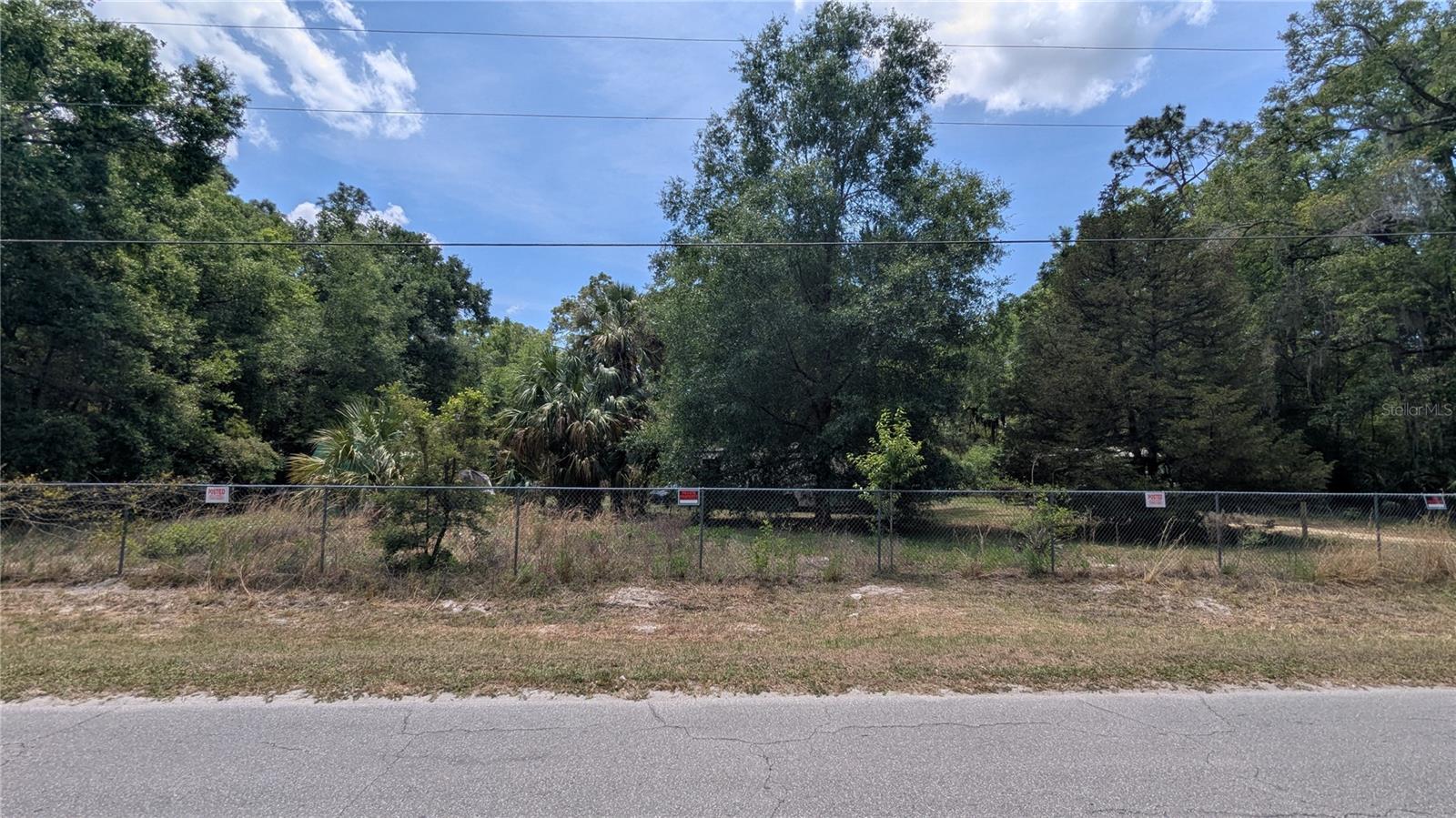 A RARE FIND! 1.25 acres with existing well and septic on a PAVED ROAD in the Florida Highlands. Zoned AG. Less than 10 minutes to Walmart, Timber Ridge hospital, restaurants, shopping, and more. Easy access to state route 200 to either Ocala or Citrus County. Enjoy the quiet country feel while being only minutes to all that Ocala has to enjoy