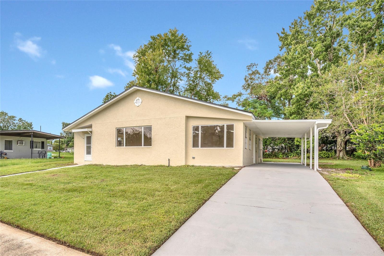Brand new roof, July 2025! Brand new A/C, July 2025! All new appliances and brand new water heater 2025. This beautiful and fully upgraded home features all new quartz kitchen countertops and cabinets, new tile floors throughout the home, tons of natural light, new paint inside and out, and completely updated bathrooms. Ideally located in the heart of Deltona, has no HOA payment at all, and is on public sewer so NO septic to worry about. Schedule your private showing today!