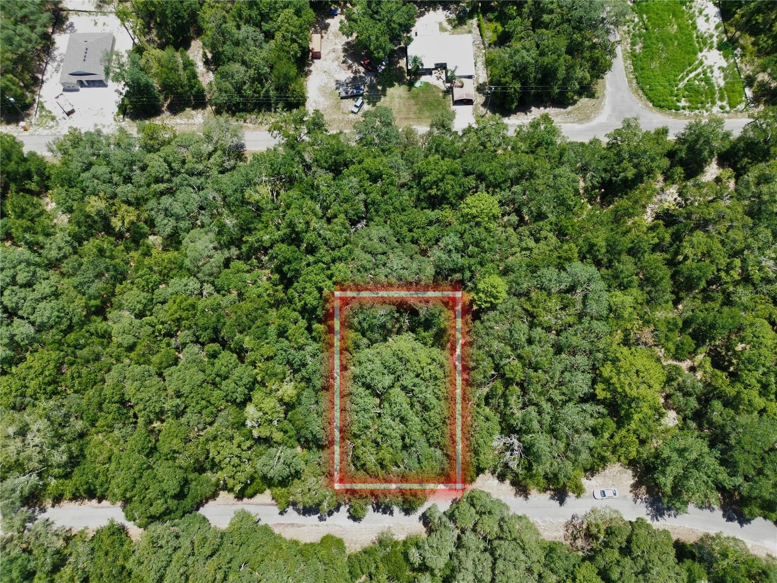 Build your dream home on this 0.23-acre lot in the growing community of Ocklawaha, Marion County.
Located just off SW Fisher Lane Dr, this property is zoned R1 and is perfect for a single-family home. The lot is in Flood Zone X, which means it’s considered low-risk for flooding—great peace of mind for future homeowners.
The property will need a well and septic system, but electric service is nearby, and the area is seeing exciting growth with new homes and infrastructure going in. Underground utility work—possibly for fiber or communication lines—has recently been spotted on the same road, showing real investment in the neighborhood.
This is a great opportunity to own land in an up-and-coming area with easy access to lakes, nature, and all that Central Florida has to offer.