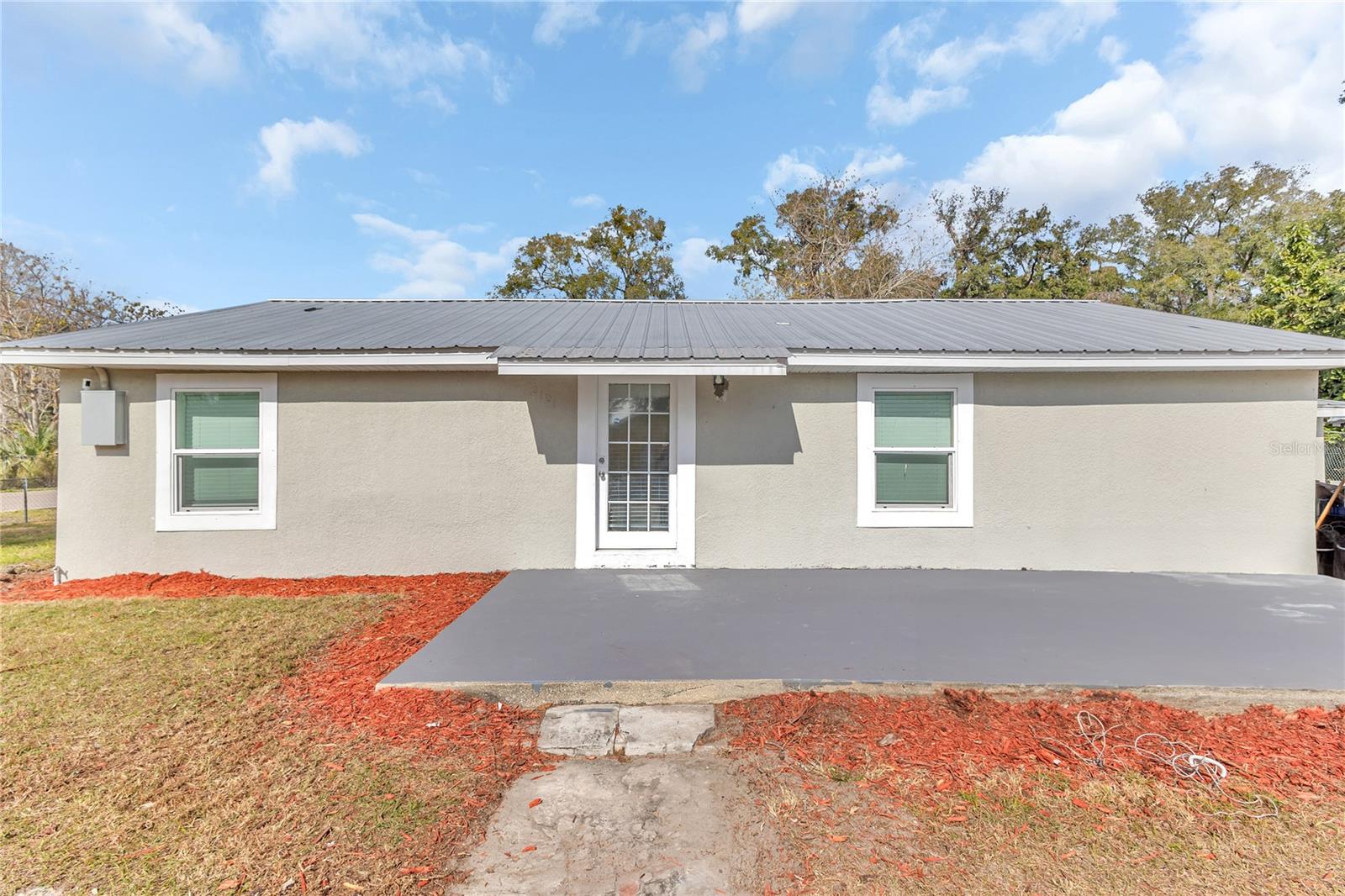 Tucked away on a quiet street in Apopka with no HOA, this unique two-lot property offers incredible flexibility, comfort, and income potential. The main home features 3 bedrooms, 1 bathroom, a welcoming living area, an updated kitchen, and both a side porch and front patio—great for relaxing or entertaining outdoors.
On the adjacent parcel, a detached in-law suite/studio apartment with a private bath and kitchenette provides the ideal setup for guests, multi-generational living, or rental income. With a combined offering of two dwellings on one expansive homesite, this move-in-ready property delivers the freedom to live, invest, or grow—all with easy access to major roads, parks, schools, and shopping.