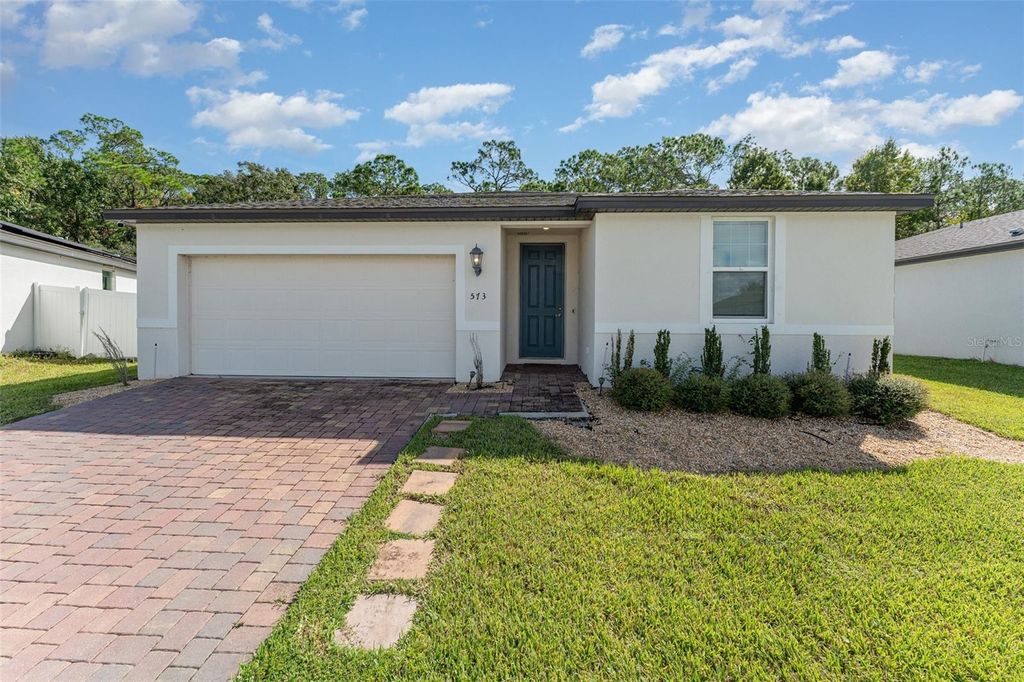 Photo of 573 Vista Villages Boulevard, Davenport, FL 33896 (MLS # TB8435503)