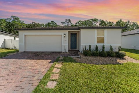 Photo of 573 Vista Villages Boulevard, Davenport, FL 33896 (MLS # TB8435503)