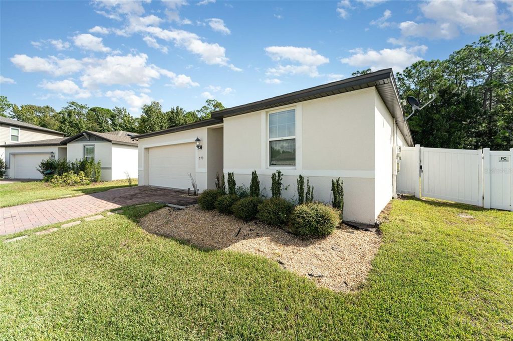 Photo of 573 Vista Villages Boulevard, Davenport, FL 33896 (MLS # TB8435503)