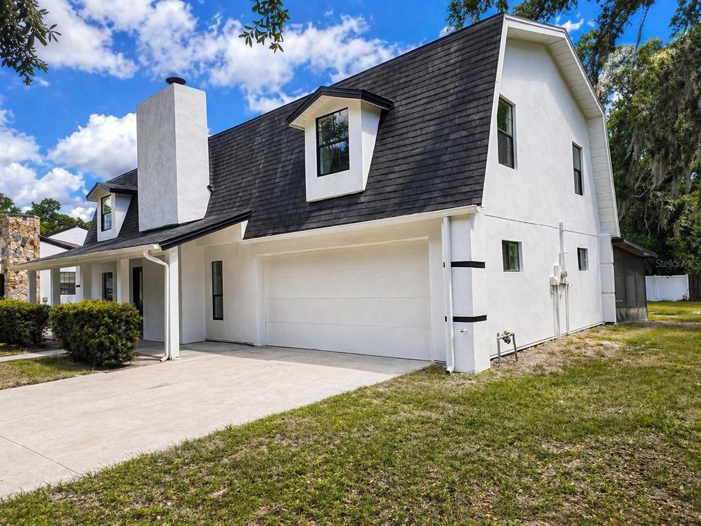 Photo of 4221 Greenfern Drive, Orlando, FL 32810 (MLS # O6402558)
