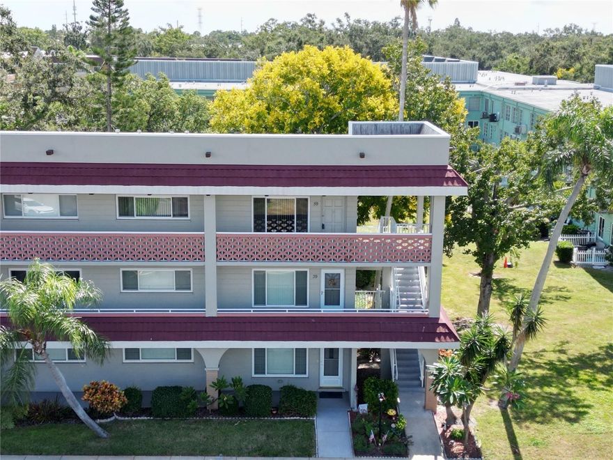 Beautiful End Unit in a Premier 55+ Community! This special end unit is a rare find, featuring additional windows that fill the home with wonderful natural light. Offering the perfect blend of comfort, convenience, and community, this spacious 2-bedroom, 2-bath condo boasts approximately 1,400 square feet of living area. Located in a vibrant community, residents enjoy an active lifestyle with access to two private golf courses (9-hole and 18-hole), two heated pools, and two activity centers filled with clubs, events, and social opportunities. Stay fit and connected with amenities including a state-of-the-art fitness center, tennis and pickleball courts, and so much more. While this home is ready for your personal touch, it’s priced accordingly—a great opportunity to make it your own! Ideally situated near beautiful beaches, shopping, dining, entertainment, and transportation, this condo isn’t just a home, it’s a lifestyle upgrade. Schedule your showing today and discover the best in active, carefree living!