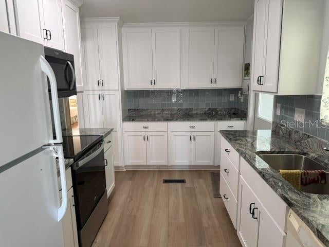 Photo of 3412 Oakwood Boulevard N, Sarasota, FL 34237 (MLS # A4709854)