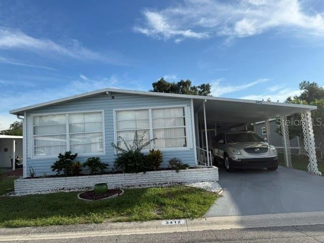 Photo of 3412 Oakwood Boulevard N, Sarasota, FL 34237 (MLS # A4709854)
