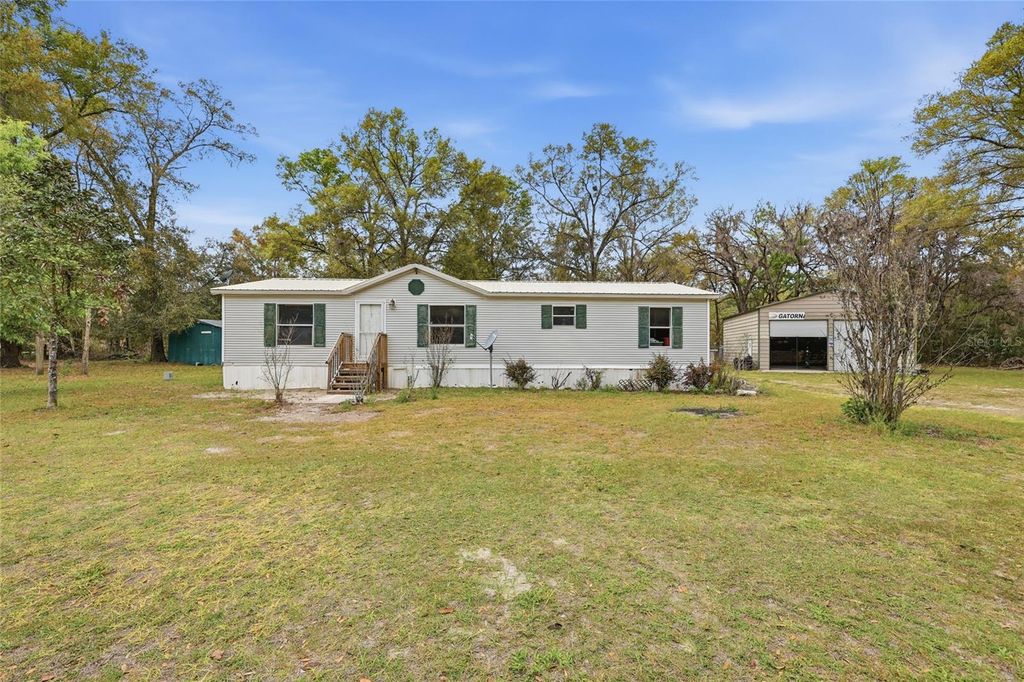 Photo of 1494 SW Spruce Road, Fort White, FL 32038 (MLS # GC538916)