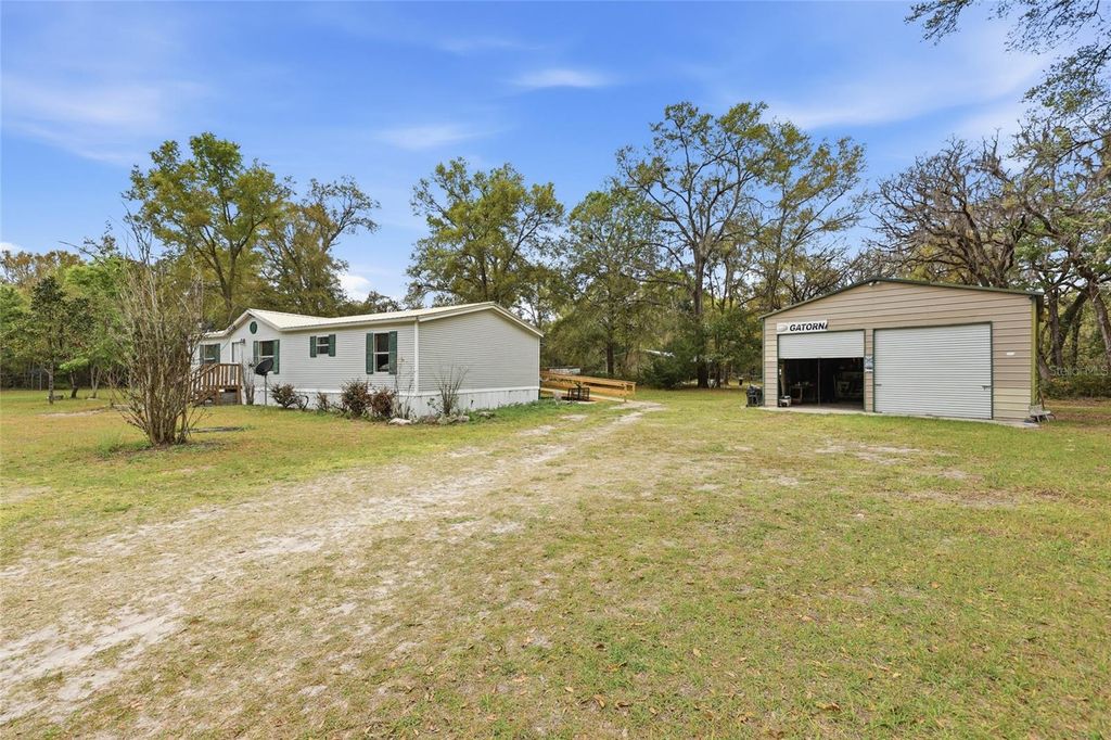 Photo of 1494 SW Spruce Road, Fort White, FL 32038 (MLS # GC538916)