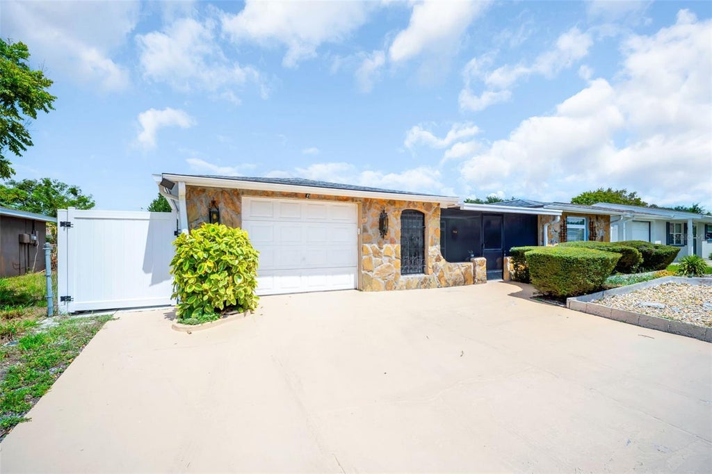 Photo of 7825 Bloomfield Drive, Port Richey, FL 34668 (MLS # TB8544181)