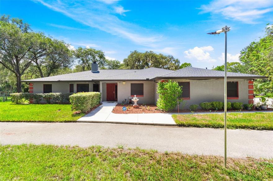 **ASK About our 30% Down Seller financing option for $2400/month** Welcome home to Morrison Rd. a true sanctuary that offers an unparalleled blend of privacy and comfort This 3-bedroom, 3-bathroom masterpiece is gracefully set on a sprawling 2.88-acre estate, making it more than just a home; it's your personal haven. As you step inside, you'll find a dedicated office space that allows you to balance work and life effortlessly. The home also features a versatile bonus room, perfect for anything from a hobby room to a gym or guest suite. For those moments of refined entertaining, the formal living room provides a relaxing setting. Want to start out with instant equity? This home has recently appraised for $480K!

What sets this home apart is the private en suite bathrooms in both the master and guest bedrooms, offering a level of personal comfort that's hard to find. Add to this a unique double-sided fireplace that enriches multiple living spaces, and you have a home that's both cozy and functional. Nature lovers will appreciate the lanai, accessible from multiple rooms, and nearly 3 acres of land that offer limitless possibilities. Imagine gardening, setting up a playground, or even expanding your own fruit orchard with the 5 existing fruit trees.

Your peace and solitude are assured in this secluded oasis, but that doesn't mean you're cut off. With the potential for 0% down financing, your dream home is surprisingly attainable. Plus, Lake Griffin State Park is just a 12-minute drive away, perfect for weekend adventures or spontaneous fishing trips. Conveniently located close to major highways and essential amenities, this home offers the best of both worlds.

So, just imagine the boundless freedom and opportunities that come with over 2 acres of your own land. What are you waiting for? Let's turn your real estate dreams into reality today. Ready to make a move? Contact us today to discuss this special financing option and let's arrange your private tour of this exceptional and affordable property!