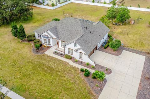 Photo of 5092 NE 81st Boulevard, Wildwood, FL 34785 (MLS # O6373301)