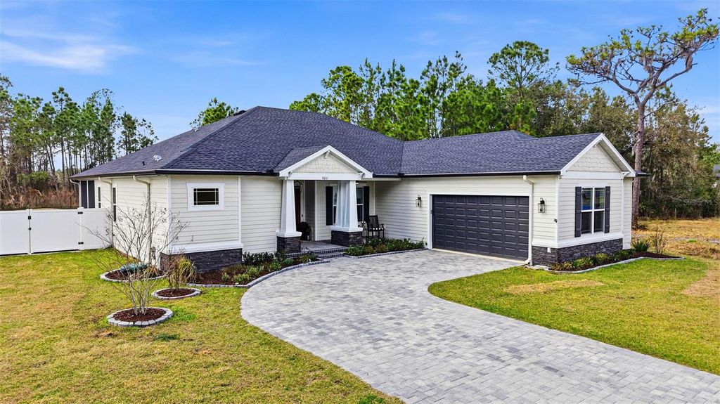 Photo of 8001 Woodleaf Boulevard, Wesley Chapel, FL 33544 (MLS # TB8464672)