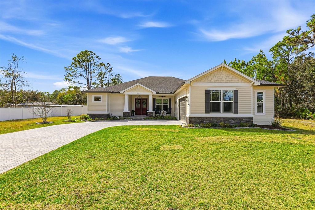 Photo of 8001 Woodleaf Boulevard, Wesley Chapel, FL 33544 (MLS # TB8464672)