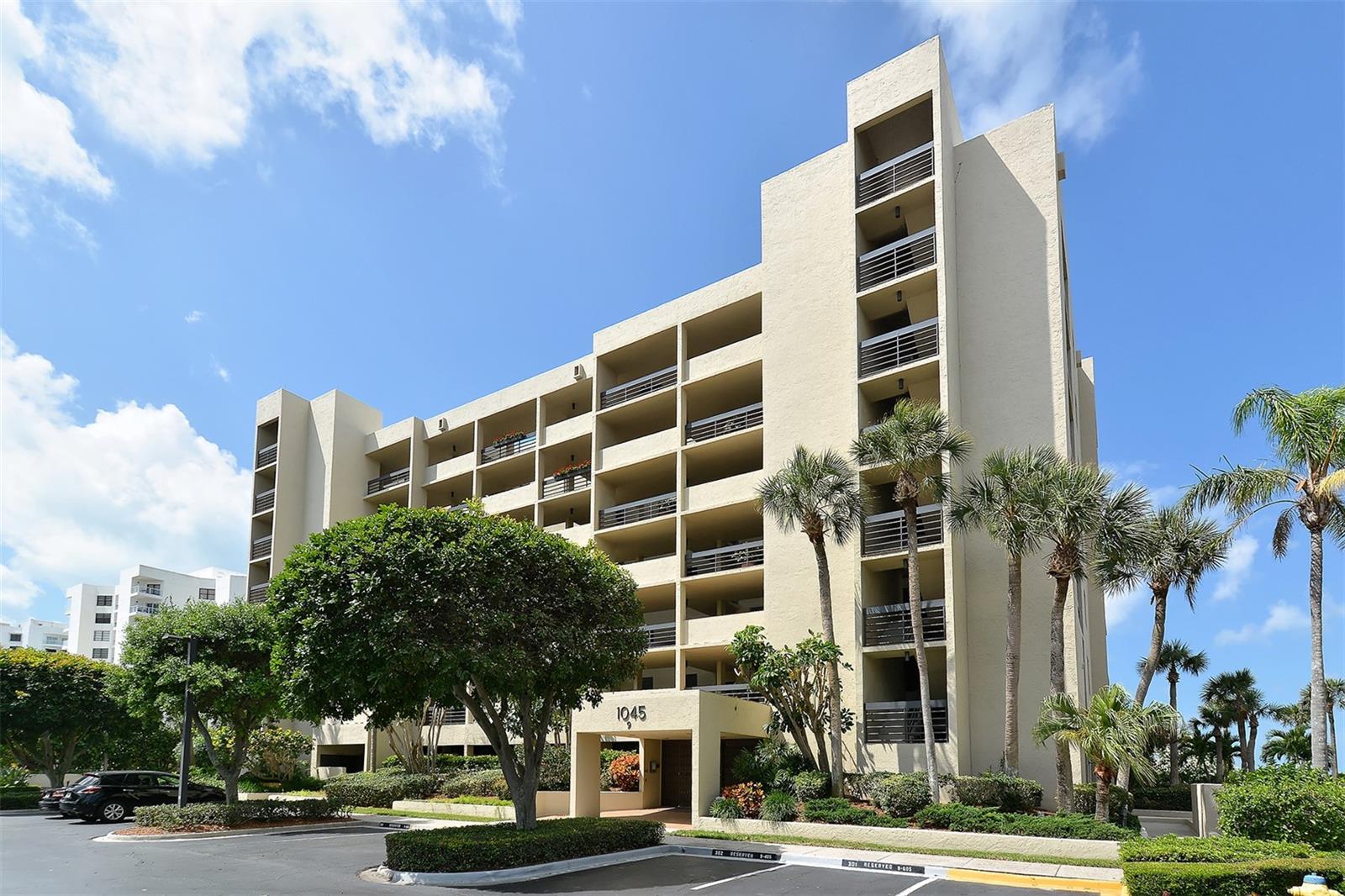 Coastal living at its finest and the perfect beach front retreat. This fourth floor residence offers views of the beach, the sparkling Gulf of Mexico, and breath taking sunsets year round with new impact windows and sliding glass door. The interior has been beautifully updated with a new kitchen, a nice large pantry and breakfast bar. Both bathrooms offer a walk in shower with a glass enclosure and new vanities, There is tile flooring in the living areas, carpeting in the bedrooms and an Under Building Parking Place. Beachplace offers a Jr. Olympic sized swimming pool with swim lanes, a splash pool, hot tub, fitness center, grilling area, tennis, pickle ball and a 24 hour guard gated entrance. All furnishings are included and this would make a great rental. New HVAC system in June 2025.