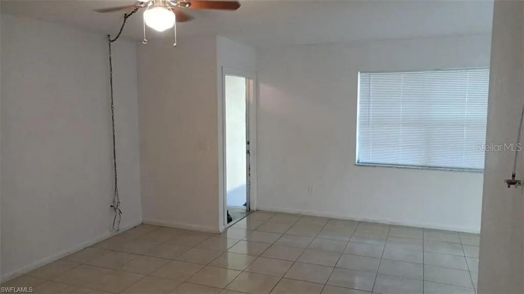 Spacious, top-floor 2?BR/1?BA unit in a quiet 7-unit complex in historic Edison Park, Fort Myers. Bright, garden-style layout with tile floors throughout and an open living/dining area. Functional eat-in kitchen with breakfast counter. Enjoy a private screened balcony and assigned parking. Freshly painted walls, ceiling fans, and central A/C. Conveniently located minutes from downtown, US-41, I-75, Edison Mall, parks, dining, and shopping. Community laundry on-site; lawn care, trash removal, and water included. No pets; non-smoking. Available for immediate move-in.