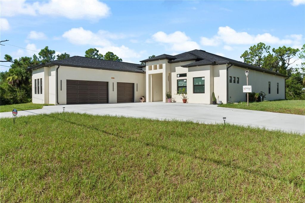 Photo of 17513 Clover Avenue, Port Charlotte, FL 33948 (MLS # C7513463)