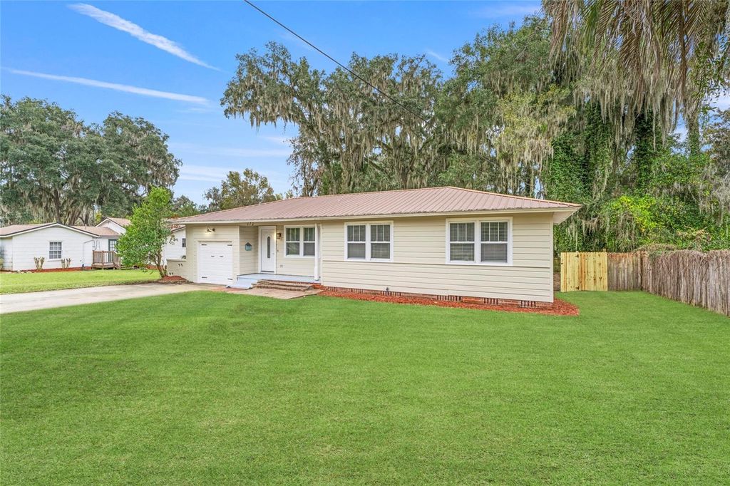Photo of 172 SE Saint Margarets Street, Lake City, FL 32025 (MLS # OM714901)
