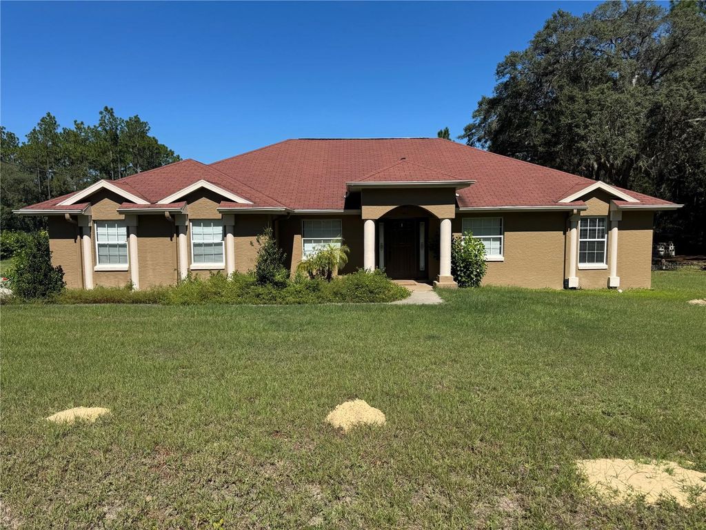 Photo of 5615 SW 138th Terrace, Ocala, FL 34481 (MLS # OM714178)
