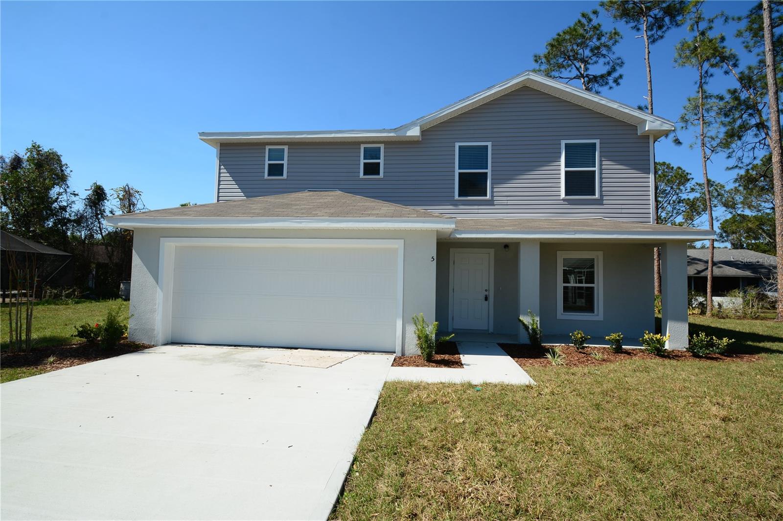 Escape into the tranquil oasis of 5 Wendlin Ln, nestled in the heart of Palm Coast, FL, where your dream home awaits. This spacious 2,800 sq ft abode offers the perfect blend of comfort and luxury, boasting five generously sized bedrooms that promise restful nights and rejuvenating mornings. With three full bathrooms, each family member can enjoy their own private retreat, enhancing the sense of space and convenience. The open floor plan invites you to explore expansive living areas, perfect for both entertaining guests and enjoying quiet family moments. Imagine the culinary adventures you can embark on in the roomy kitchen, designed to inspire your inner chef. The abundant natural light cascading through large windows creates a warm and welcoming atmosphere throughout the home. Situated in a serene neighborhood, this property provides a peaceful escape while being just moments away from local amenities and Florida's stunning coastline. Whether you're looking to bask in the sun-drenched backyard or relax in one of the inviting living spaces, this residence offers endless possibilities. Discover the perfect blend of style and function at 5 Wendlin Ln, where every day feels like a getaway. Make this house your home and start creating cherished memories today.
