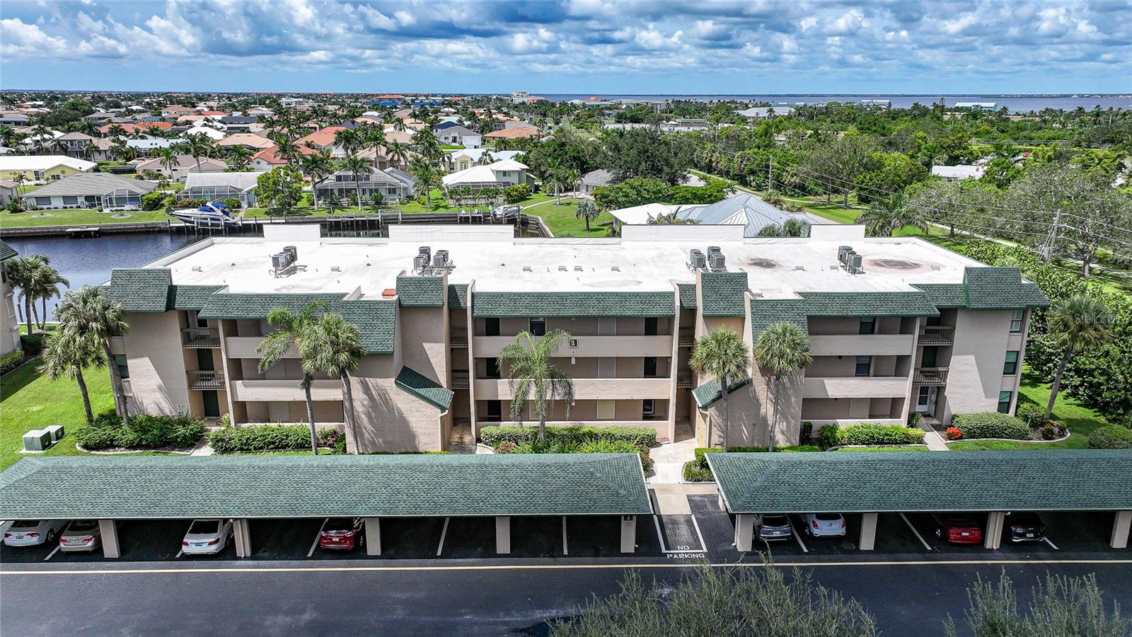 STUNNING 2 BEDROOM 2 BATH CONDO IN BANYAN POINT! This first floor end unit has been meticulously updated throughout. The kitchen features solid wood cabinets and nearly new granite countertops. A breakfast bar separates the kitchen from the spacious open concept dining/living area. The living room has a dry-bar and wine refrigerator making this an excellent home for entertaining. The entire condo has tile flooring.
The lanai has been incorporated into the living area providing leisurely canal viewing with AC and heat for comfort 365 days a year. Seawall slips are available at Banyan Point on a first come basis.
The spacious main bedroom has an ensuite bath with double sinks, walk-in shower and lots of closet space. The second bedroom has nice privacy and is a step away from the second full bathroom.
Offered ‘turn-key’ and furnished, the new owners need simply to walk in the door and start enjoying the ‘Florida Gulf Coast lifestyle’ with all the amenities and comforts this home offers.
Banyan Point is a friendly and welcoming community. It’s just a short walk to Fisherman’s Wharf, one of the area’s most popular shopping and dining complexes located directly on the Peace River waterfront. Historic Punta Gorda is well known for having numerous dining and shopping options. The downtown area frequently hosts car and boat shows as well as friendly block parties for those who like to socialize. Lively music and gathering places or the quiet beauty of spectacular sunsets are around every corner in this unique south Florida town.