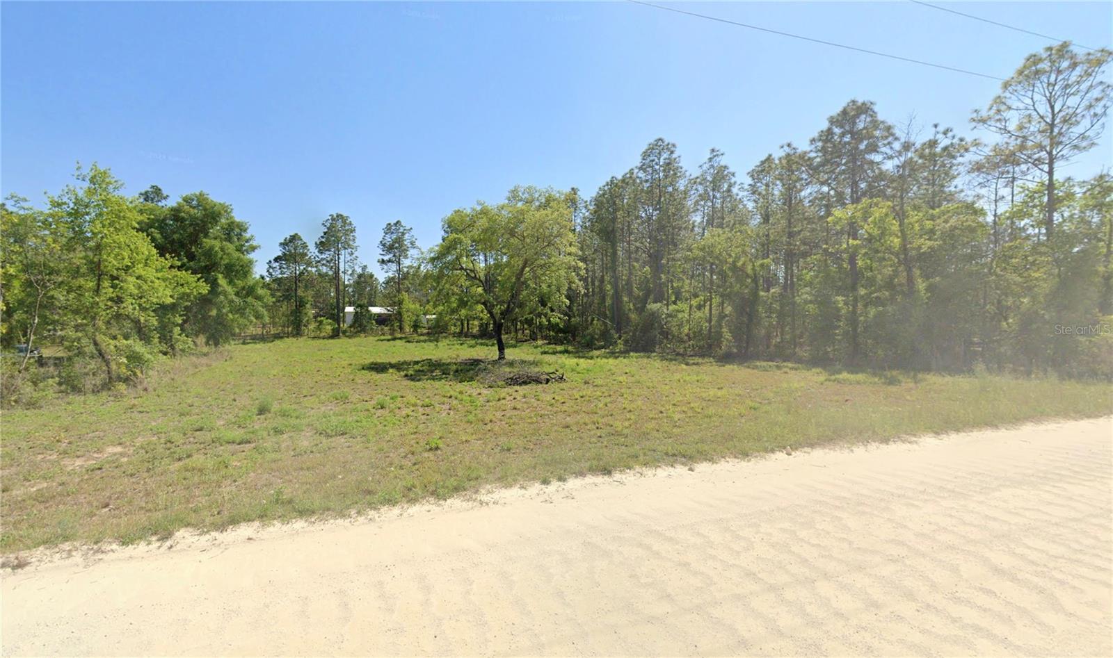 CLEARED lot. At 1.13 acres, this lot is a bit larger than most of the 1 acre lots in the area. Mobile/Manufactured homes are welcome here. Bring your animals and toys, no HOA fees or restrictions out here. No flood zone to worry about, this is a very dry neighborhood overall. The tree clearing should save you around $7-8K in costs. You can see that just one tree in the middle and around the edges for privacy has been left. GPS coordinates to center of property: 29.348303, -82.553541. Enter coordinates into google or apple maps for directions. Zoned Agricultural/Rural Residence. Seller has several other vacant lots available in the area that are not listed publicly. Ask for a list to choose from. Priced to sell quickly!