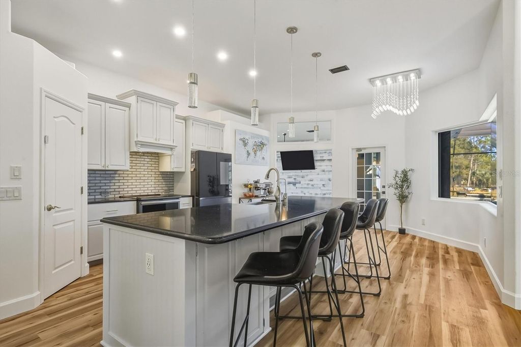 Photo of 6488 Ponce De Leon Boulevard, North Port, FL 34291 (MLS # A4680796)