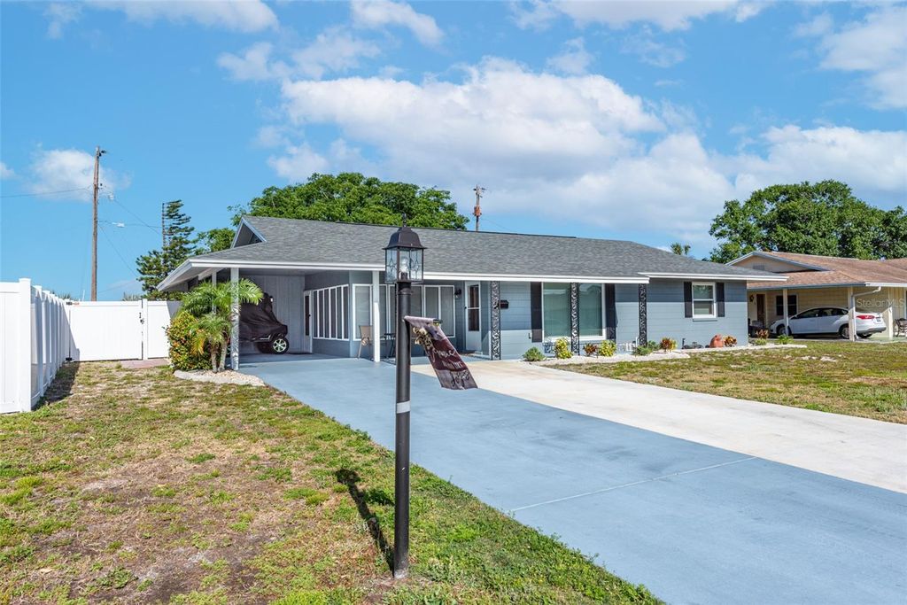 Photo of 906 Hacienda Dr, Sun City Center, FL 33573 (MLS # TB8385448)