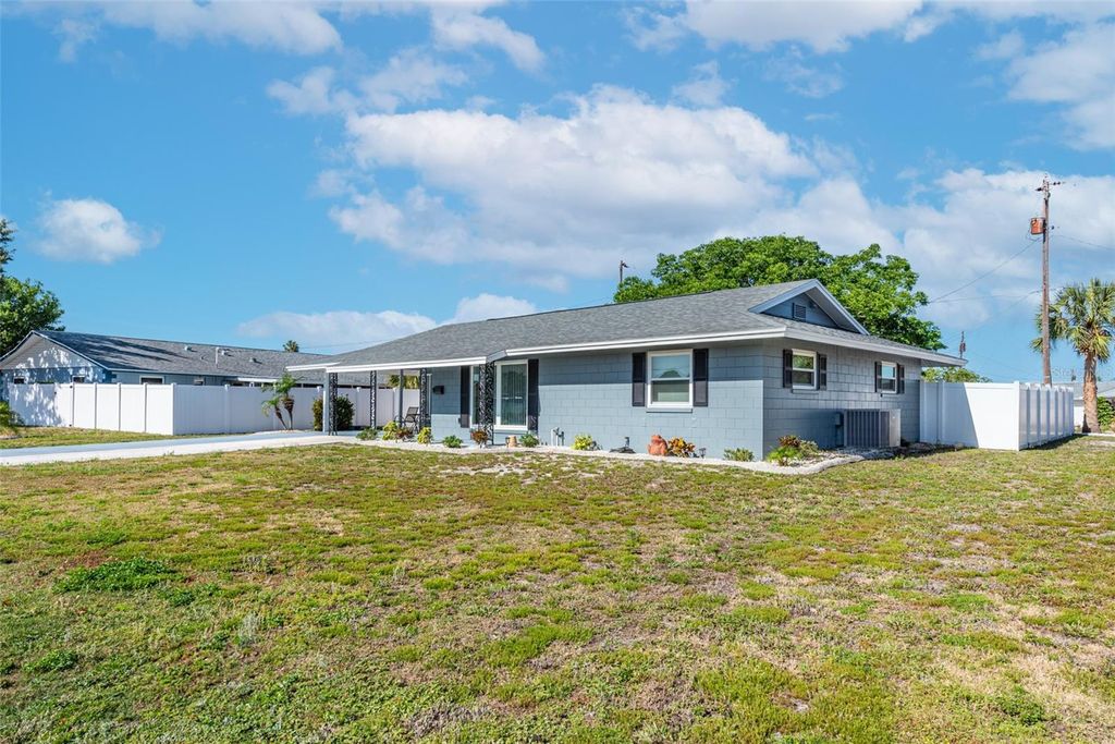 Photo of 906 Hacienda Dr, Sun City Center, FL 33573 (MLS # TB8385448)
