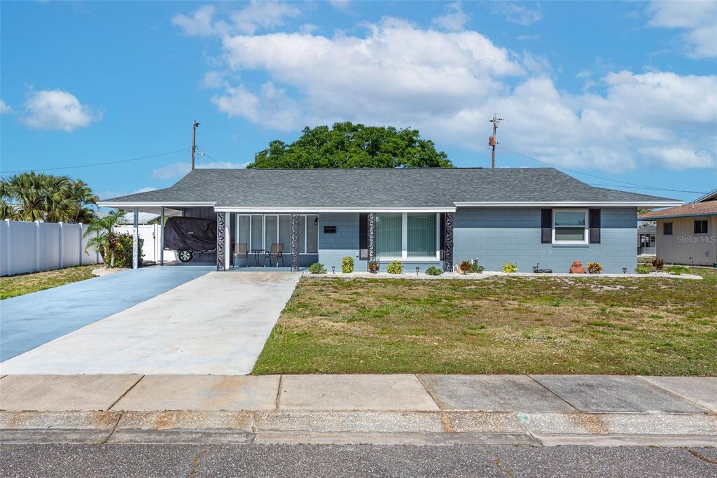 Photo of 906 Hacienda Dr, Sun City Center, FL 33573 (MLS # TB8385448)