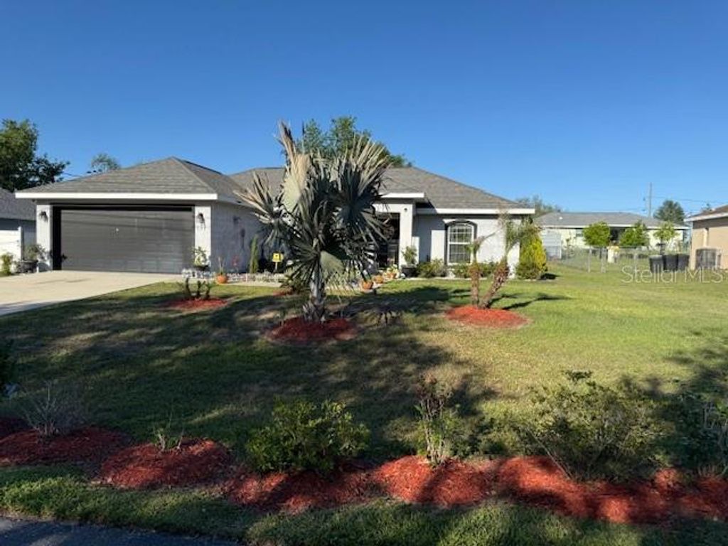 Photo of 137 Juniper Loop, Ocala, FL 34480 (MLS # OM697954)