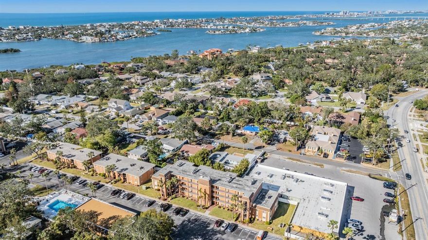 Updated 2BR/2BA first-floor condo in the private waterfront community of New Atlantis Club! Enjoy easy ground-level living just steps from your designated parking space. This spacious 1,300+ sq ft home features an open-concept layout, a stunning white kitchen with granite countertops, and a split-bedroom floor plan for added privacy. The primary suite offers a beautifully updated en-suite bath, walk-in closet with washer and dryer, and private screened lanai.
Resort-style amenities include two heated pools, hot tub, fitness center, clubhouse, tennis courts, shuffleboard, kayak launch, BBQ areas, Tiki huts, car wash station, and private gated access to John Bonner Park. Ideally located just over a mile from Indian Rocks Beach and a short distance to shops and restaurants. Lush tropical landscaping and an active community lifestyle complete this incredible opportunity to enjoy Florida living at its best.