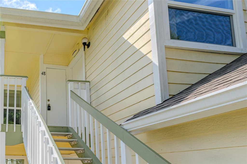 Photo of 5004 Laguna Bay Circle #48, Kissimmee, FL 34746 (MLS # O6404160)